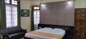 Postel nebo postele na pokoji v ubytování Apsara Guest House