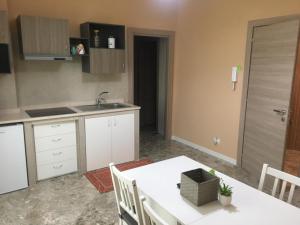 Kuchyň nebo kuchyňský kout v ubytování B&B Amores