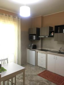 Kuchyň nebo kuchyňský kout v ubytování B&B Amores