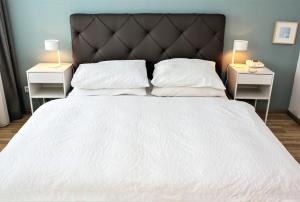 Posteľ alebo postele v izbe v ubytovaní Hotel Sonnenhof - bed & breakfast & appartements