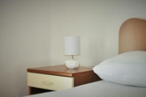 Posteľ alebo postele v izbe v ubytovaní Apartments Sandy Beach