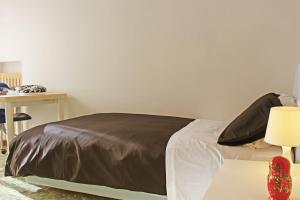 A bed or beds in a room at Attico San Francesco