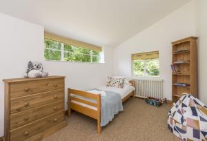 Postel nebo postele na pokoji v ubytování Horsehill Cottage
