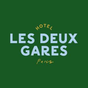 a green sign with the words las devilsgars parks at Hotel Les Deux Gares in Paris