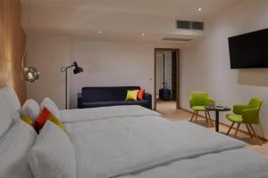 Postel nebo postele na pokoji v ubytování Hotel Passage