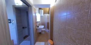 Vannituba majutusasutuses Albergo Perseo