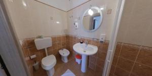 Vannituba majutusasutuses Albergo Perseo