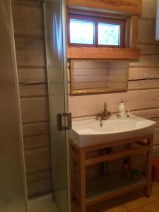 Kúpeľňa v ubytovaní Baublys Lake Lodge