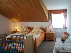 Ένα ή περισσότερα κρεβάτια σε δωμάτιο στο Haus Schmid