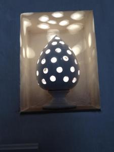 a black and white object with white polka dots at Casa Vacanze Bel sole in Monopoli