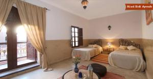 Postel nebo postele na pokoji v ubytování Riad Sidi Ayoub + 37 fotografií