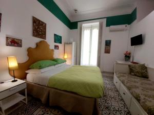 Postel nebo postele na pokoji v ubytování B&B Platamon