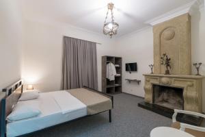 Postel nebo postele na pokoji v ubytování Hotel Opinion