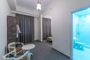 Koupelna v ubytování Hotel Opinion