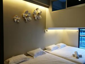 The Loft at Midhills Genting Highlands Free WiFi客房内的一张或多张床位