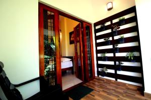 Fotografie z fotogalerie ubytování Nirrvaan homestay v destinaci Varkala