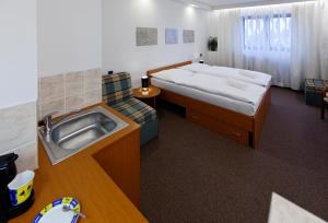 Katil atau katil-katil dalam bilik di Hotel Wolf