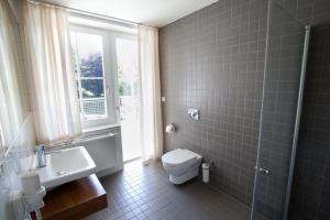 Koupelna v ubytování Hotel Radun