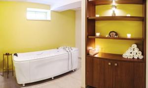 Postel nebo postele na pokoji v ubytování Hotel Radun