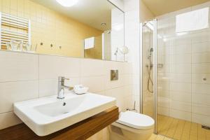 Koupelna v ubytování Hotel Radun