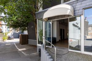 an awning on the side of a building at Boutique Essen City in Essen