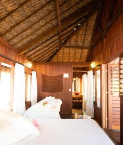 מיטה או מיטות בחדר ב-Refugios Parajuru - Villa Alegre