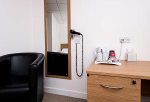 an office cubicle with a phone on a desk at Lancaster University in Lancaster