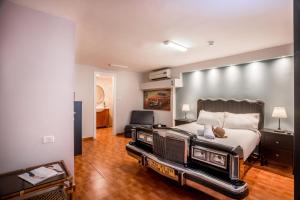 Postel nebo postele na pokoji v ubytování Avital Hotel