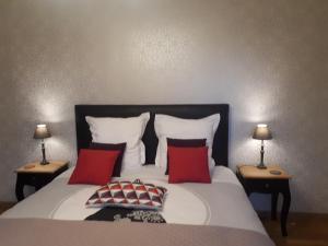 Ένα ή περισσότερα κρεβάτια σε δωμάτιο στο Chambres d'hôtes Les 4 Vents