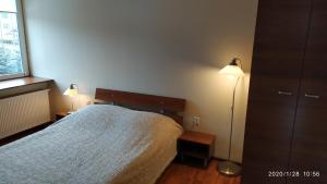 Posteľ alebo postele v izbe v ubytovaní Zawoja1560 Apartamenty przy Aptece