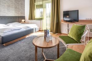 Postel nebo postele na pokoji v ubytování Hotel Birkenhof