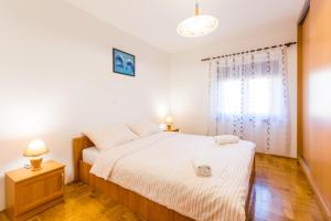 Posteľ alebo postele v izbe v ubytovaní Relaxing apartment Josip - peaceful area