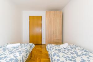 Postel nebo postele na pokoji v ubytování Relaxing apartment Josip - peaceful area