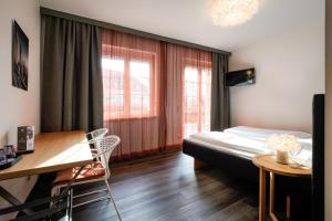 Postel nebo postele na pokoji v ubytování Hotel Birkenhof