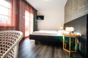Postel nebo postele na pokoji v ubytování Hotel Birkenhof