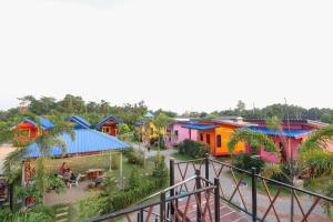 an overhead view of a village with colorful houses at Banphu Resort - บ้านปู รีสอร์ท in Rayong