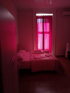Ein Bett oder Betten in einem Zimmer der Unterkunft Dimora Ruggiero