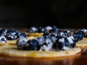 a close up of blueberries on top of pancakes at Gospodarstwo Agroturystyczne Anielin in Okonek