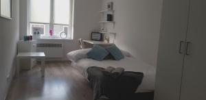 Posteľ alebo postele v izbe v ubytovaní Północna Rooms