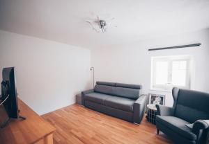 Posezení v ubytování Moderne 2-Zimmer Wohnung