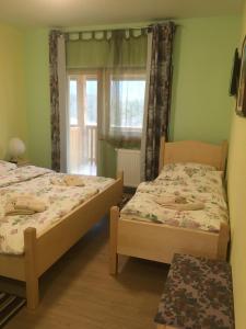 Postel nebo postele na pokoji v ubytování Ranch Marina