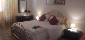 Postel nebo postele na pokoji v ubytování B&B Cuore e Vento