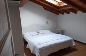 Postel nebo postele na pokoji v ubytování Cascina Volta