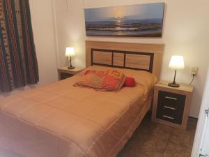 Ένα ή περισσότερα κρεβάτια σε δωμάτιο στο Villa PaloMayor
