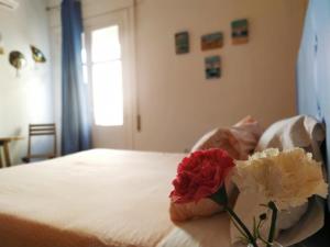 Posteľ alebo postele v izbe v ubytovaní Hostal Casa Nautilus