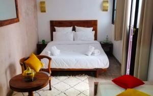 Postel nebo postele na pokoji v ubytování Riad le Voile d'Orient