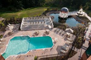 an aerial view of a swimming pool with a swimming pool at Woodcliff Hotel and Spa in Victor