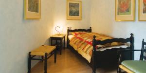 Postel nebo postele na pokoji v ubytování Ascona: Nostrana Apt. 1