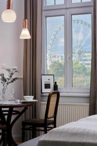 Posteľ alebo postele v izbe v ubytovaní Gellerico Apartments Deák Square