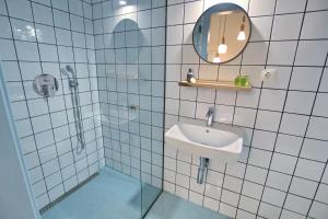 Kúpeľňa v ubytovaní Gellerico Apartments Deák Square